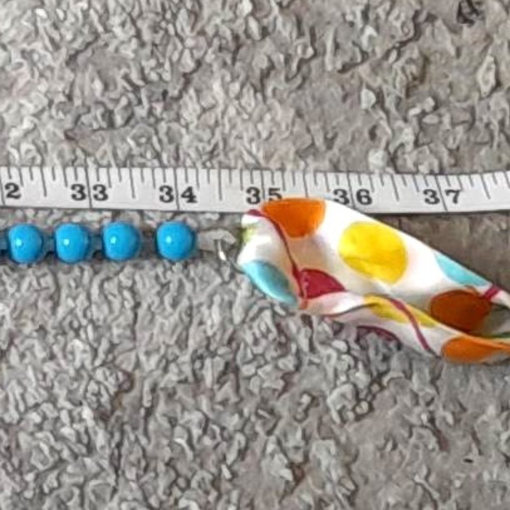 Large Turquoise Bead Necklace with a Colourful Polka Dot Fabric Closure